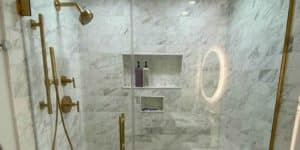 modern shower remodel with glass enclosure
