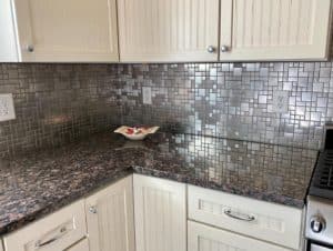 metalic or reflective backsplash